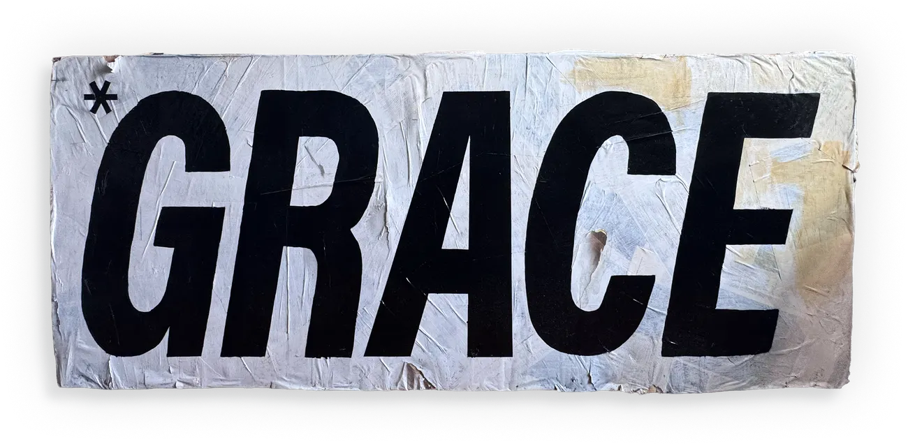 *GRACE, 2025 — the word GRACE painted large on wheatpasted panel